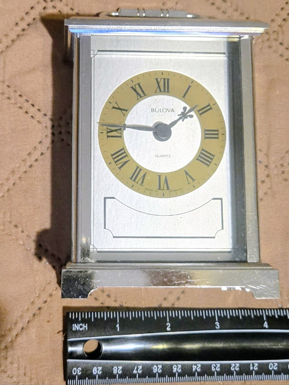 Bulova Silver Clock with Gold Dial Accent